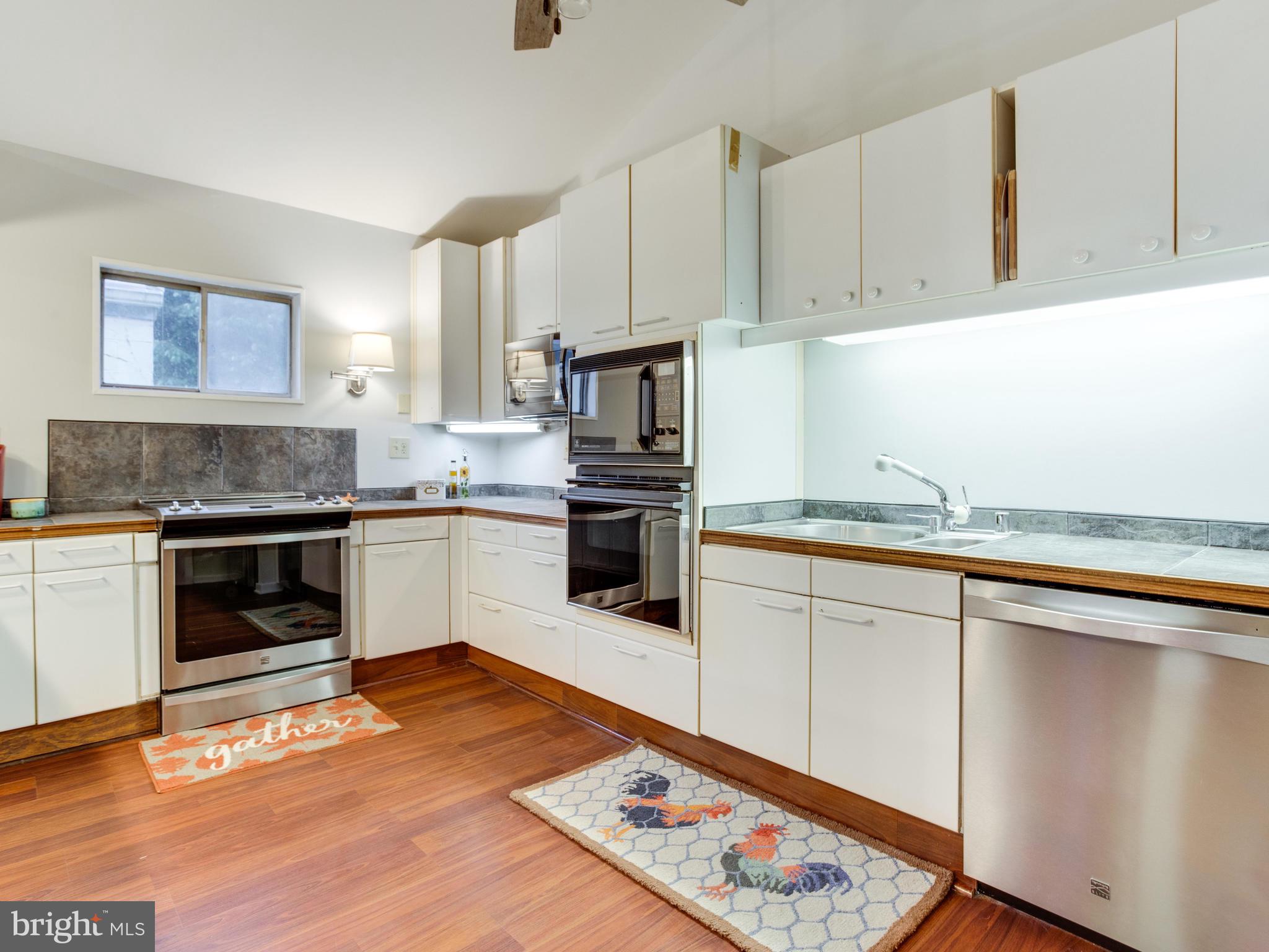 950 Mayo Road Edgewater, MD 21037 - Photo 7 of 46 Kitchen with new stainless steel appliances