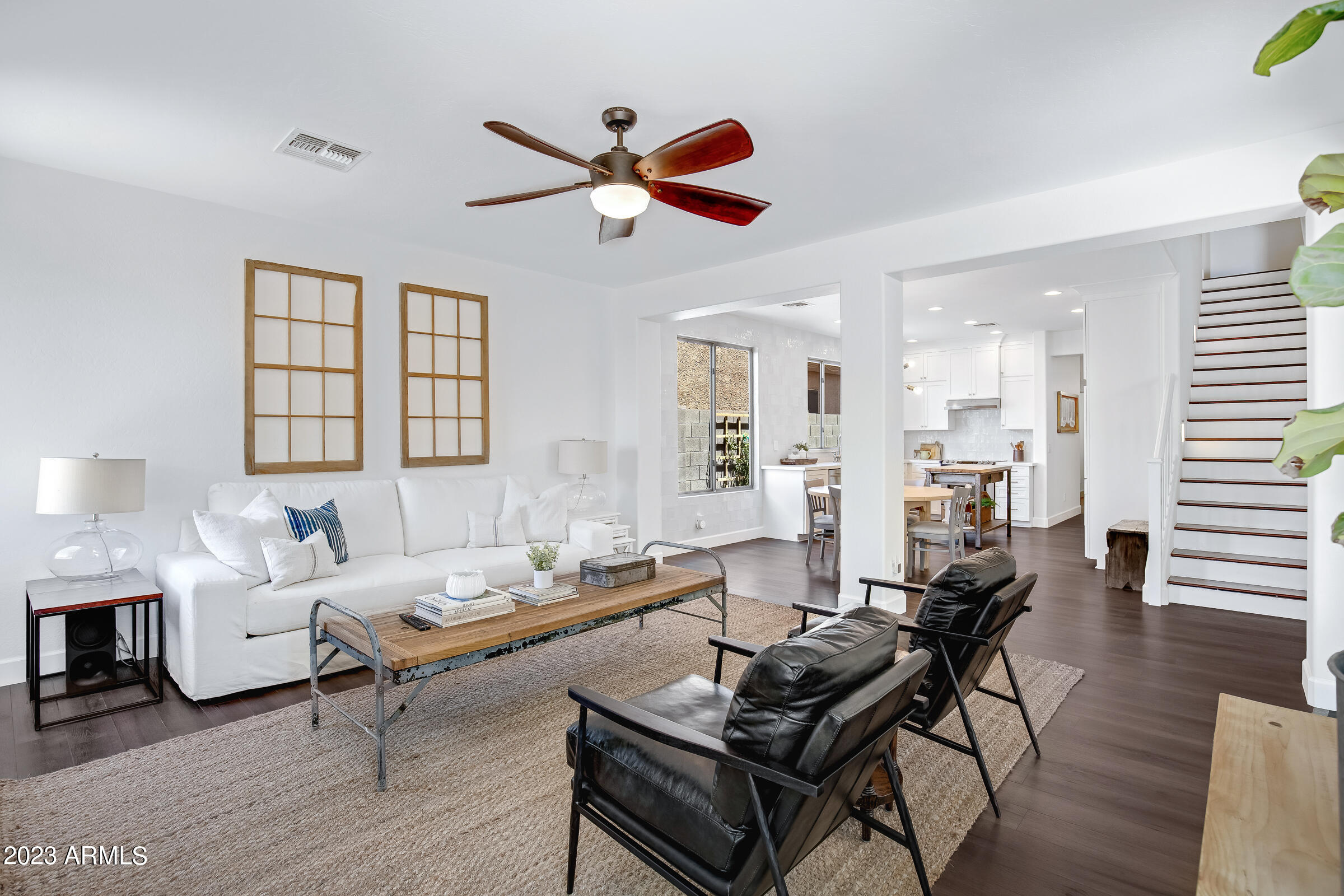 4736 East Timberline Road Gilbert, AZ 85297 - Photo 11 of 49 a living room with furniture and wooden floor