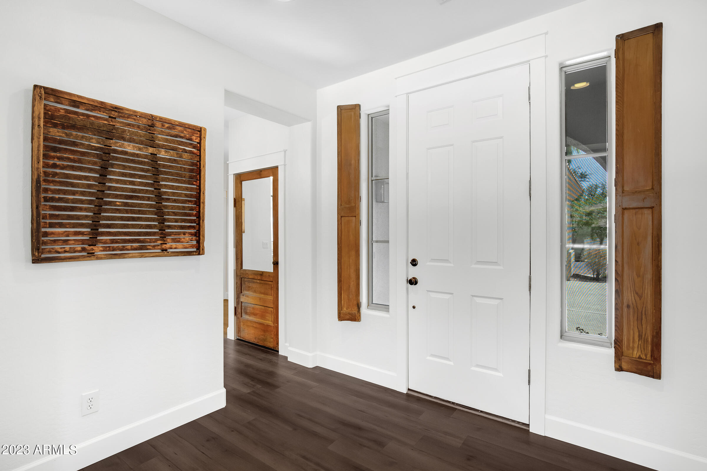 4736 East Timberline Road Gilbert, AZ 85297 - Photo 18 of 49 an empty room with wooden floor and windows