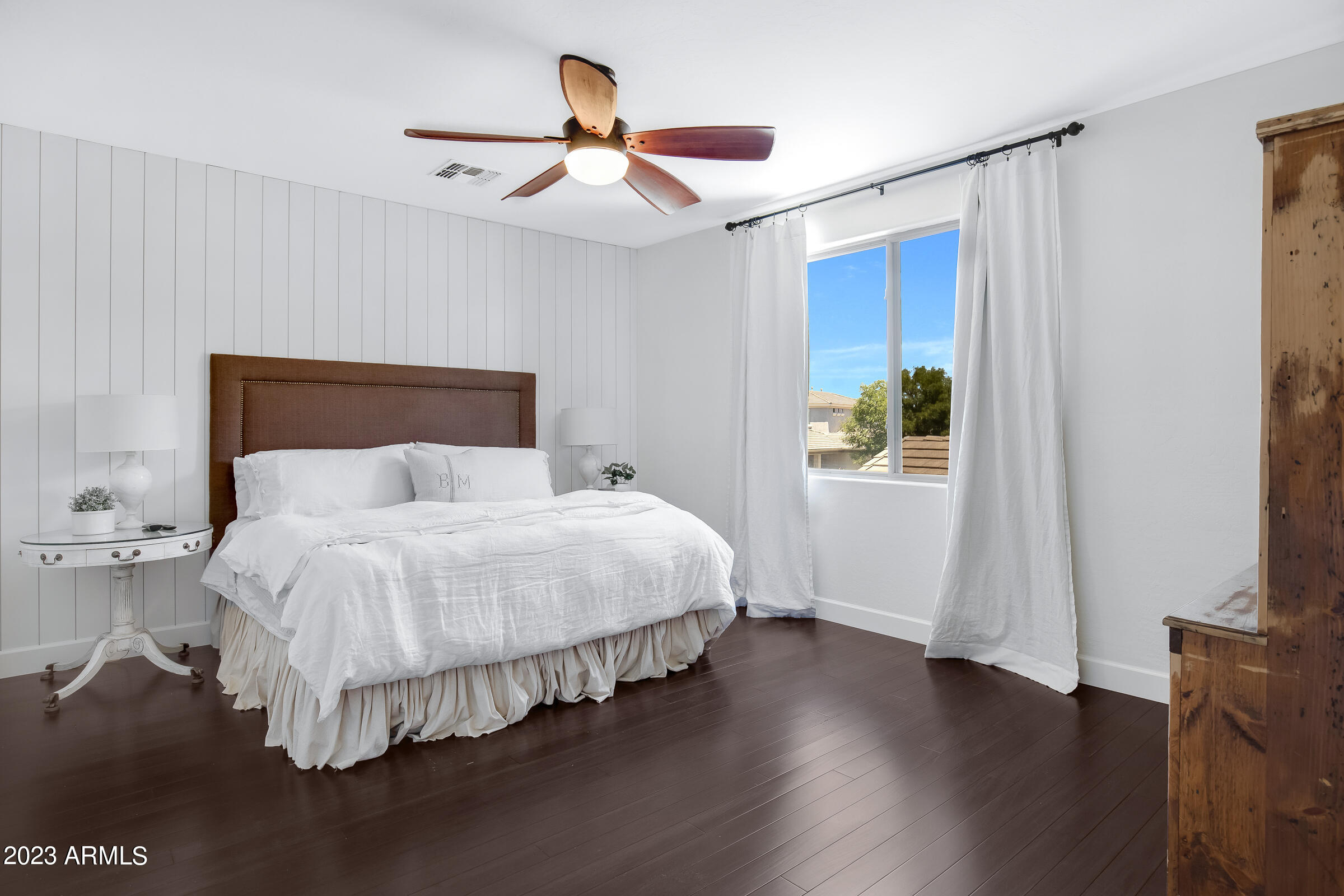 4736 East Timberline Road Gilbert, AZ 85297 - Photo 29 of 49 a bedroom with a bed and a large mirror