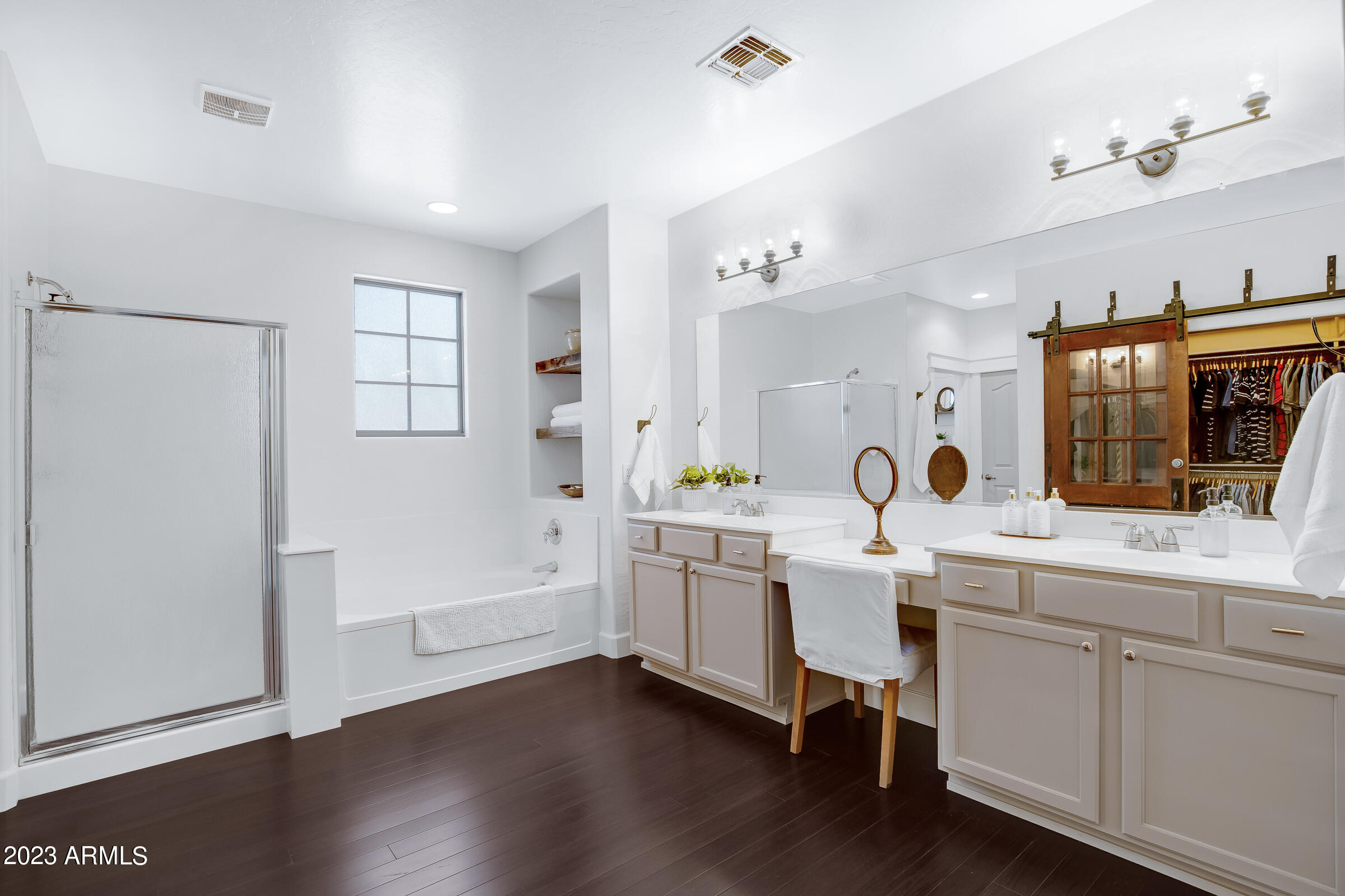 4736 East Timberline Road Gilbert, AZ 85297 - Photo 32 of 49 a kitchen with a sink cabinets and wooden floor