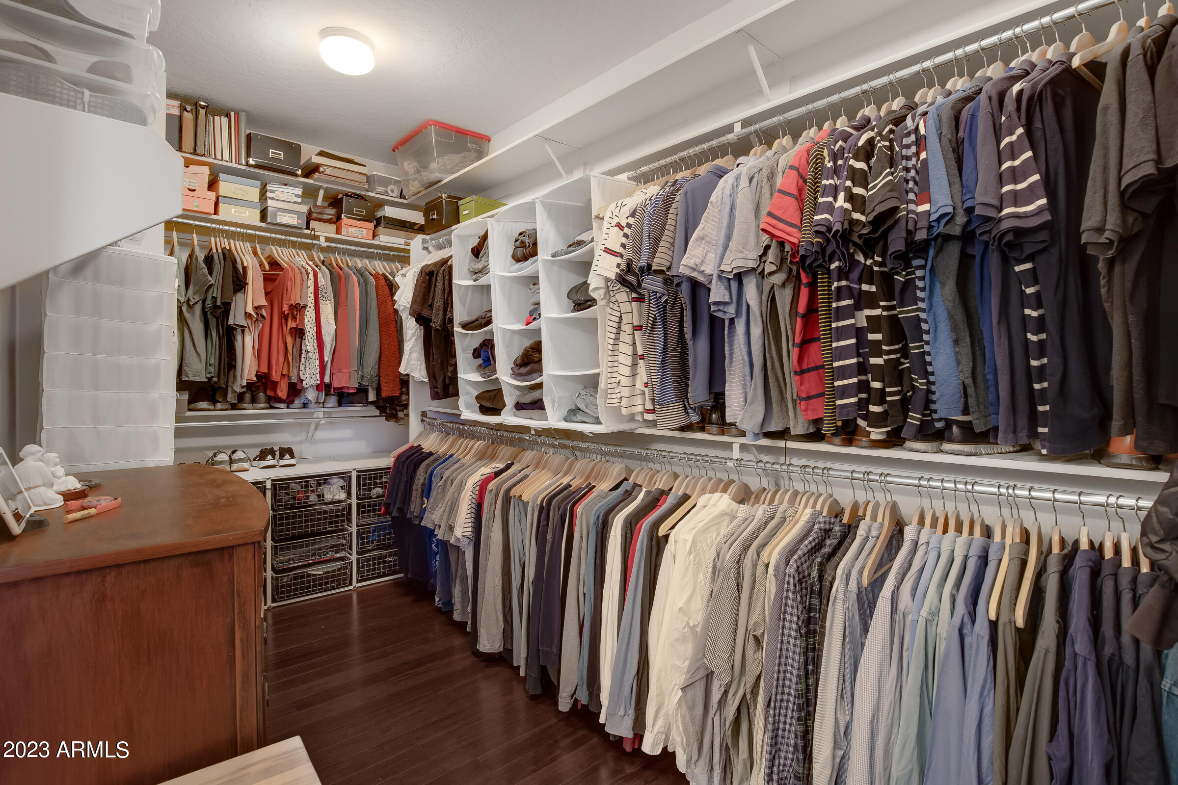 4736 East Timberline Road Gilbert, AZ 85297 - Photo 35 of 49 a view of walk in closet with clothes