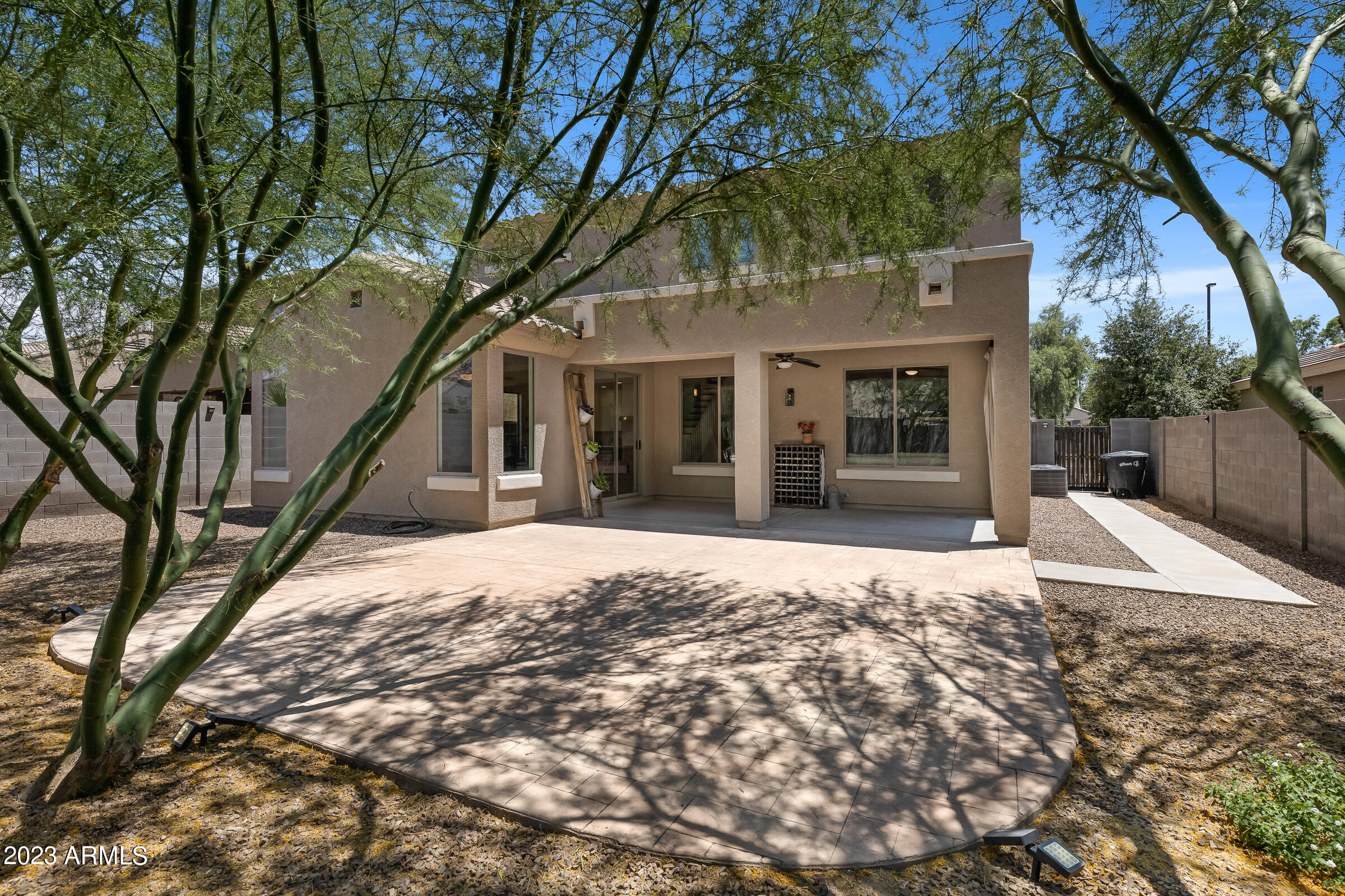 4736 East Timberline Road Gilbert, AZ 85297 - Photo 37 of 49 a house with trees in front of it