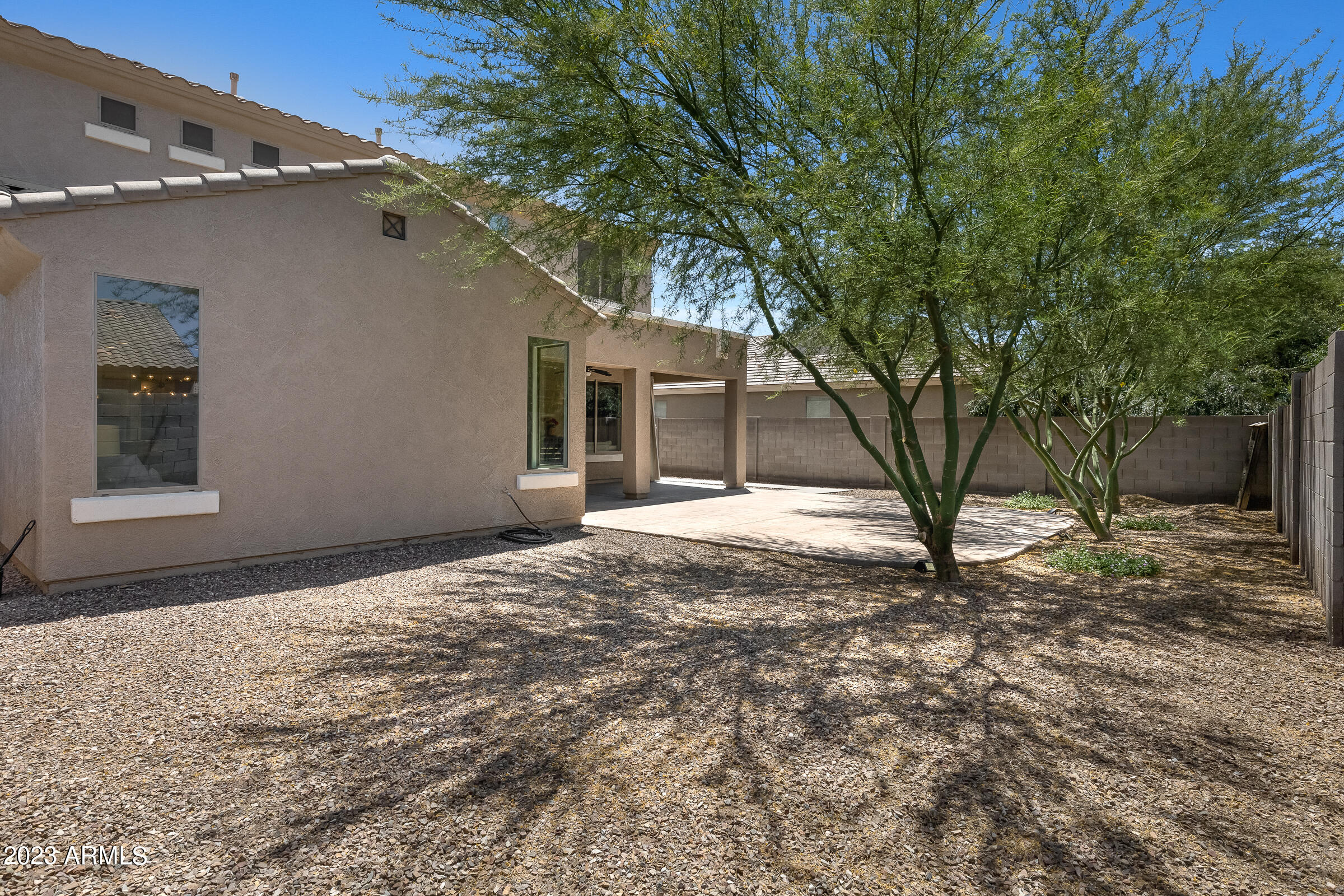 4736 East Timberline Road Gilbert, AZ 85297 - Photo 38 of 49 a house with trees in front of it