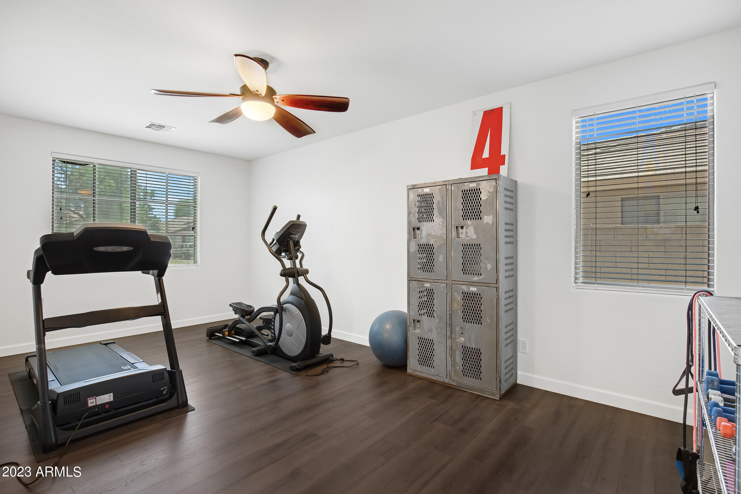 4736 East Timberline Road Gilbert, AZ 85297 - Photo 6 of 49 a view of a room with gym equipment