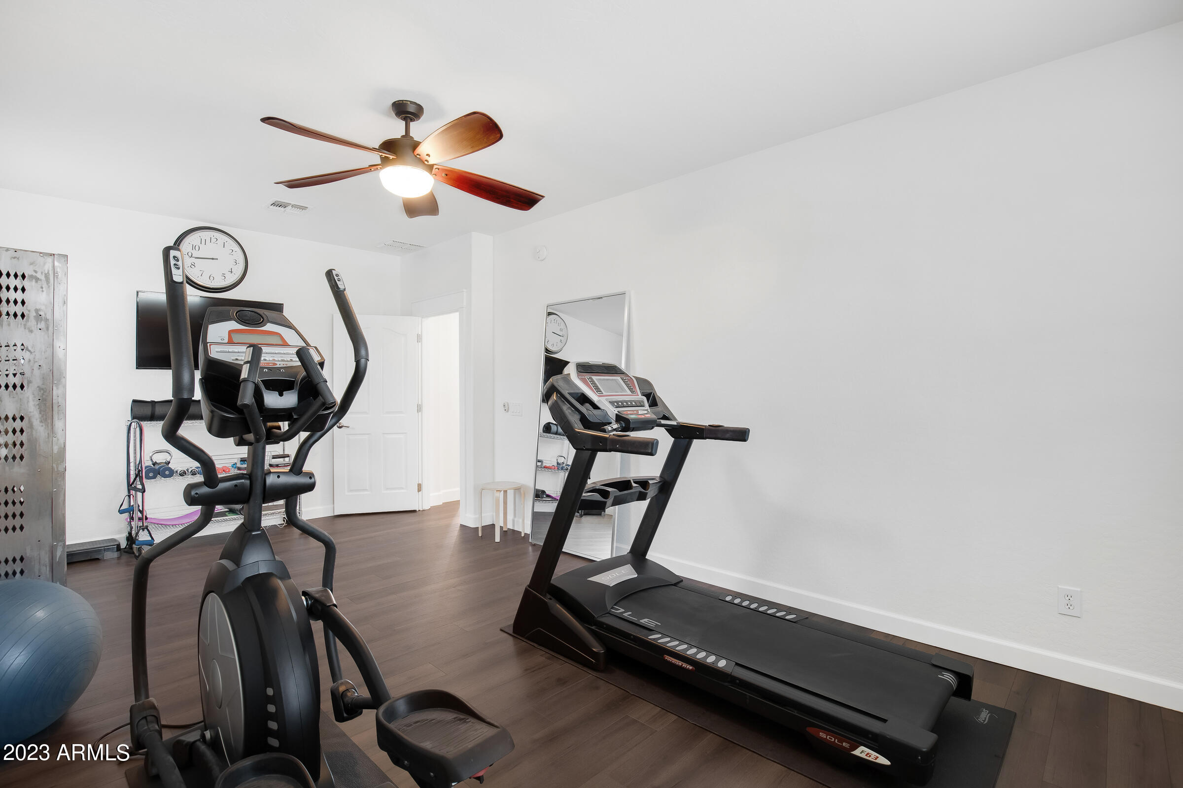 4736 East Timberline Road Gilbert, AZ 85297 - Photo 7 of 49 a room with gym equipment