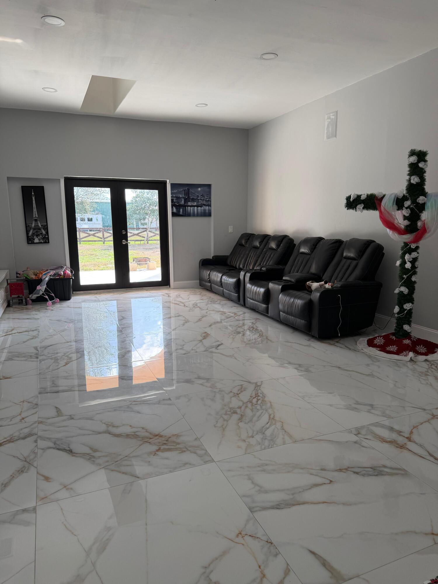 435 East A Road East LaBelle, FL 33935 - Photo 21 of 35 a living room with furniture and a large window