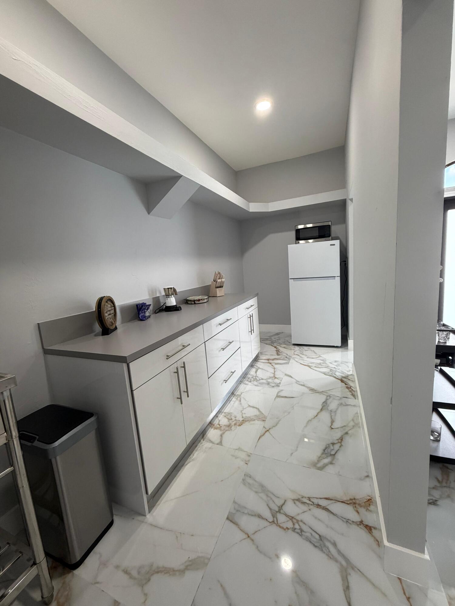 435 East A Road East LaBelle, FL 33935 - Photo 24 of 35 a utility room with cabinets washer and dryer