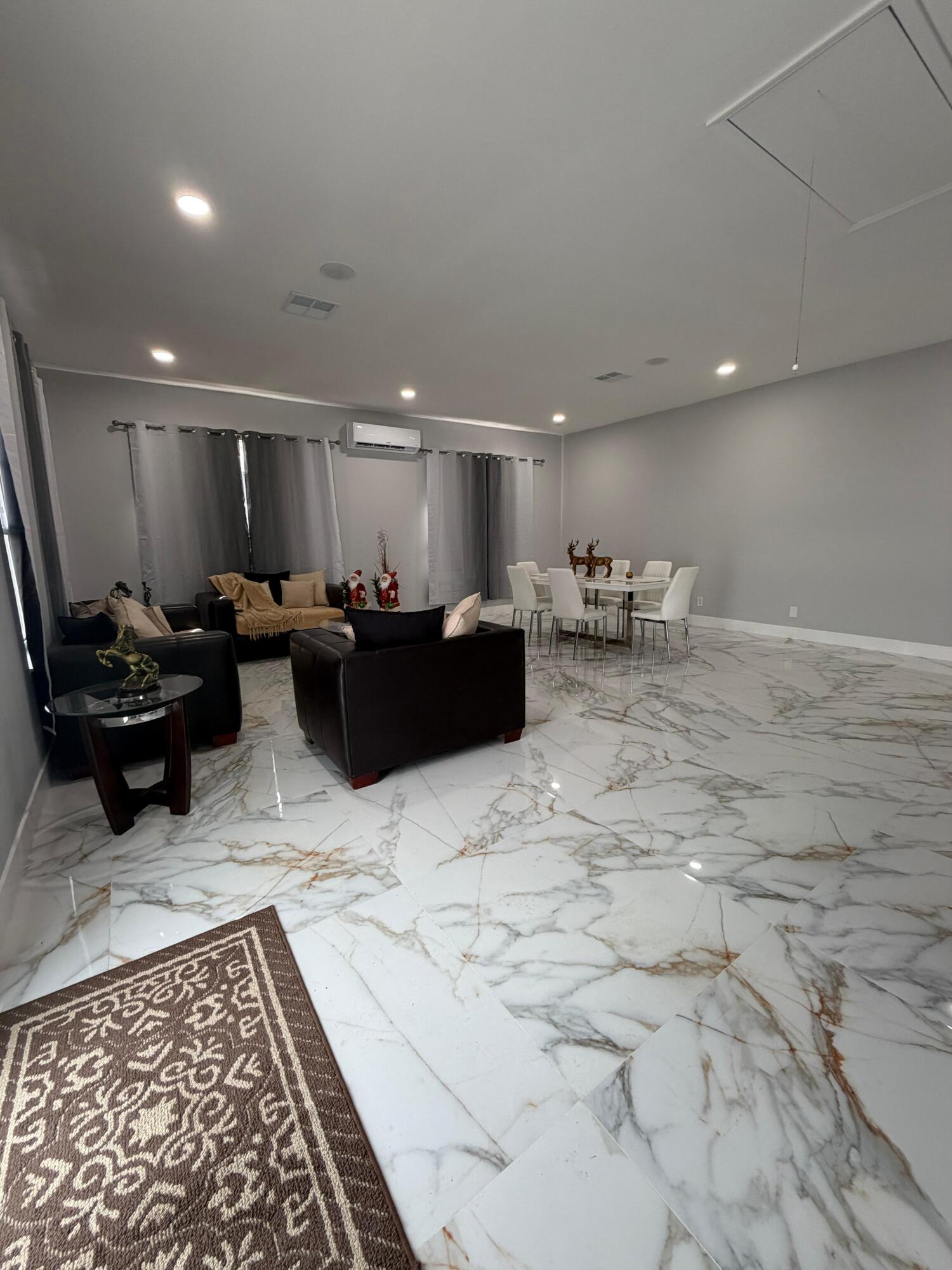 435 East A Road East LaBelle, FL 33935 - Photo 31 of 35 a living room with furniture and a couch