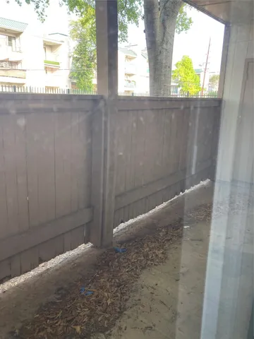 a view of a window in an empty room