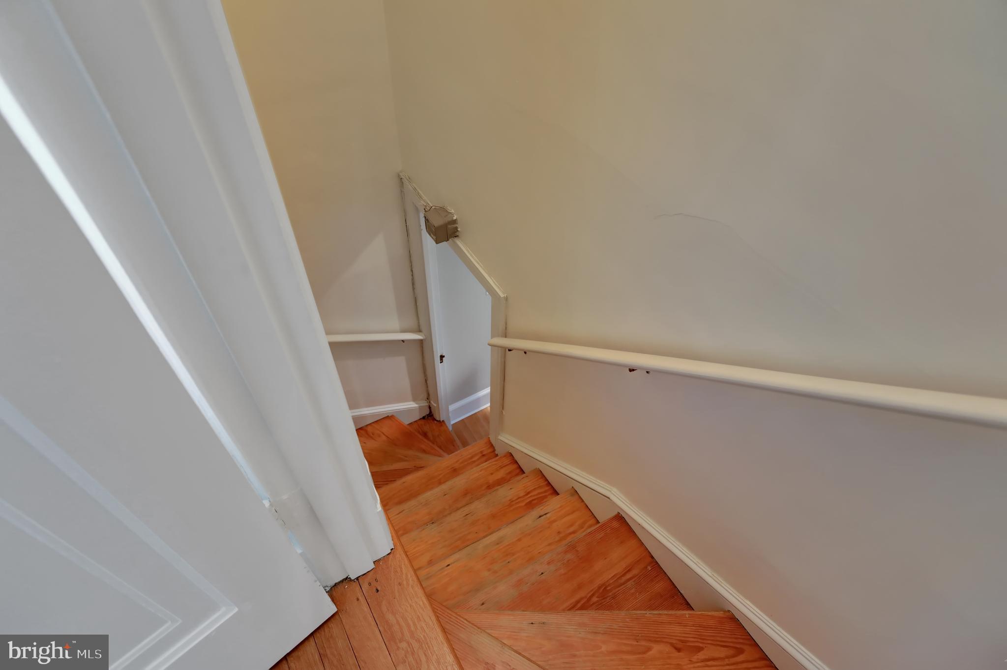 214 Northway Baltimore, MD 21218 - Photo 47 of 50 Back Staircase from Kitchen to Second Flr.