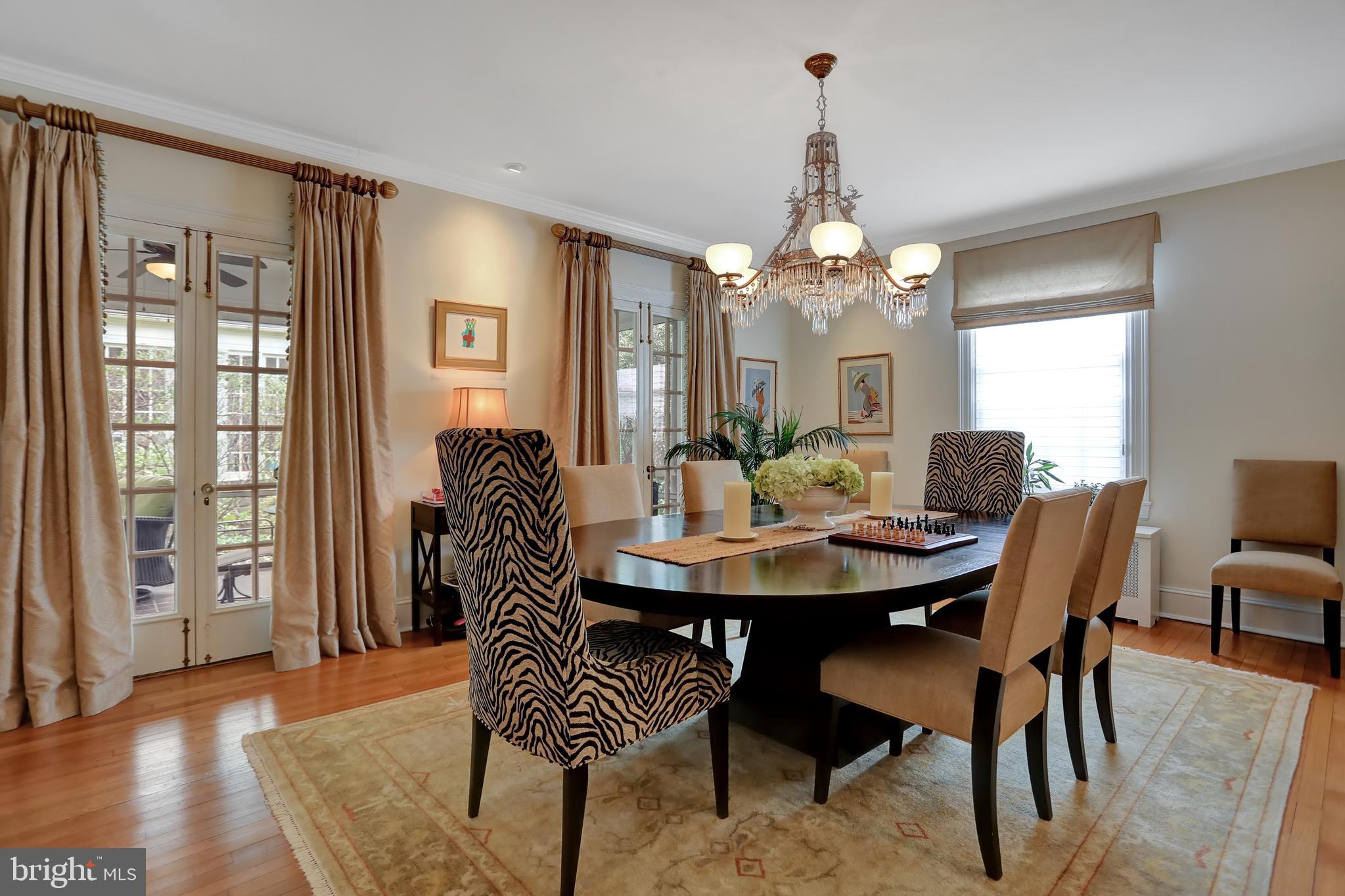 214 Northway Baltimore, MD 21218 - Photo 10 of 50 Dining Room with view to Screened Porch
