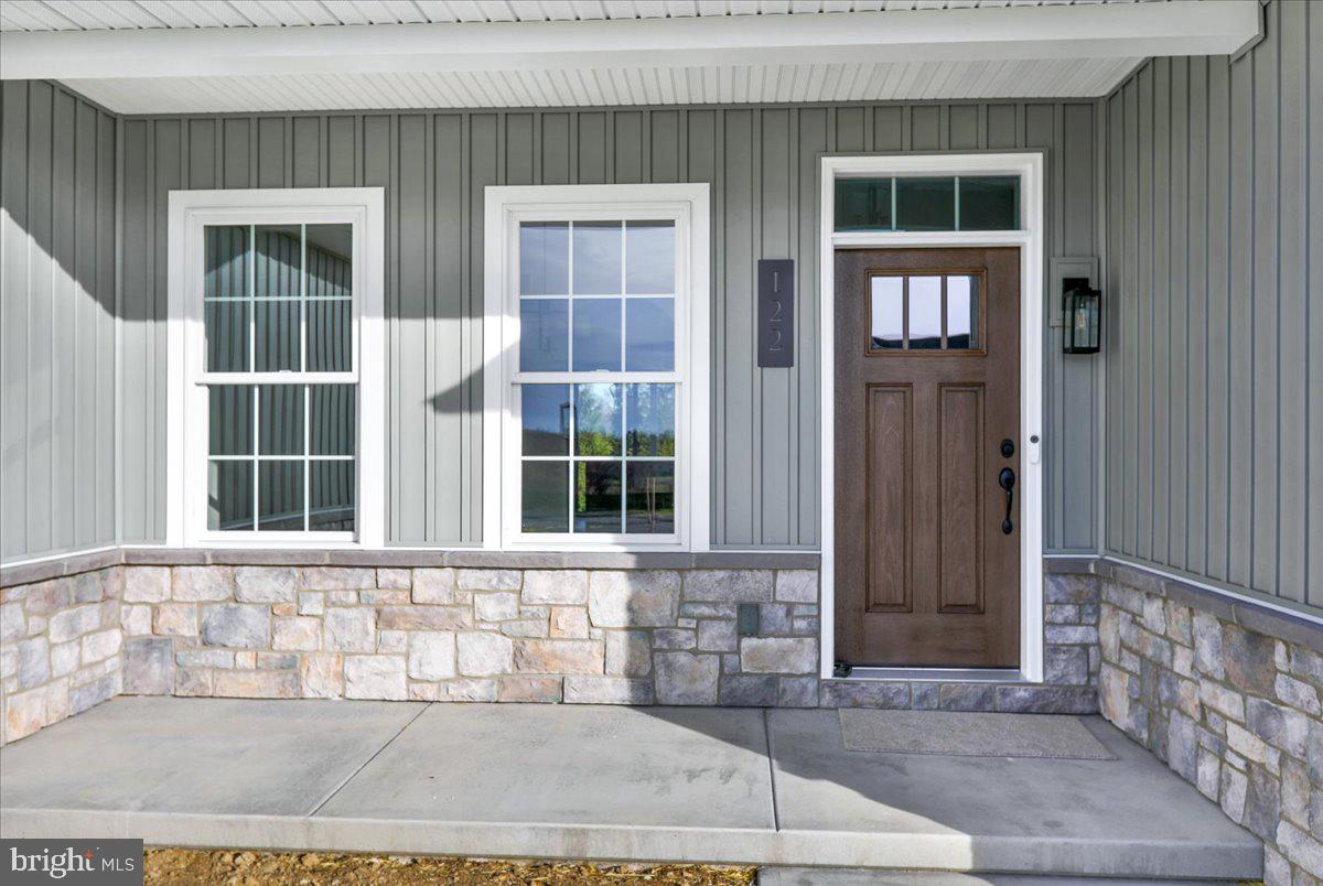 4 Rolling Meadow Road Lebanon, PA 17046 - Photo 2 of 37 a view of a brick house with a window and brick walls
