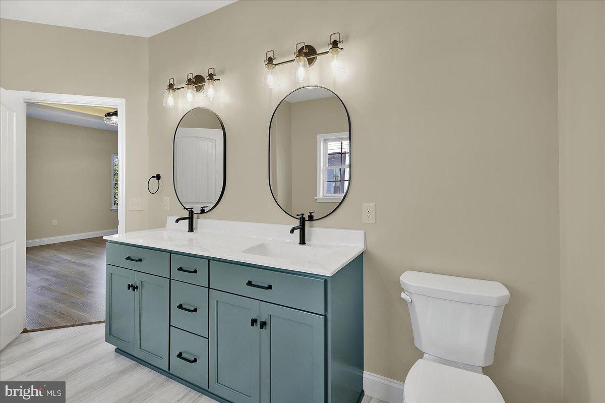4 Rolling Meadow Road Lebanon, PA 17046 - Photo 27 of 37 a bathroom with a toilet sink and mirror