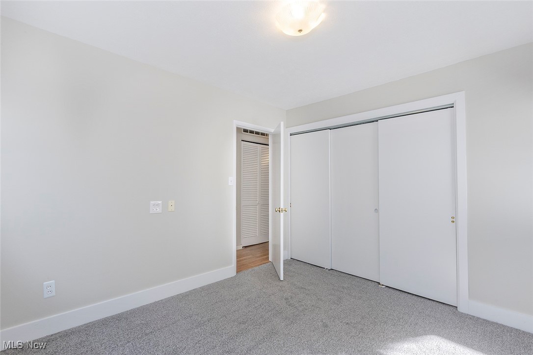 1691 Harwich Road Lyndhurst, OH 44124 - Photo 27 of 45 Bedroom with carpet and a closet