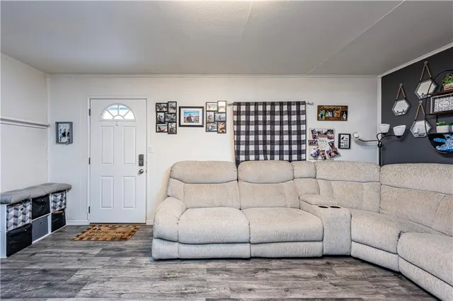 a kitchen with a stove a sink and a refrigerator