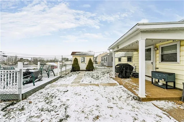 a view of a terrace with a barbeque