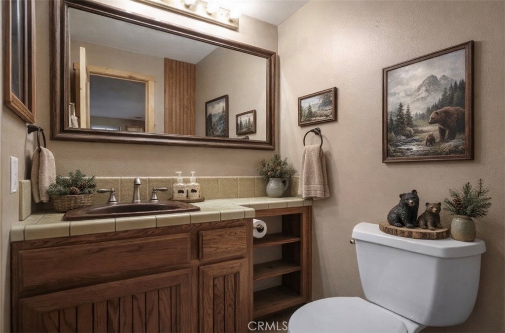 21645 Jobs Peak Road Cedarpines Park, CA 92322 - Photo 20 of 72 Bathroom staged by AI