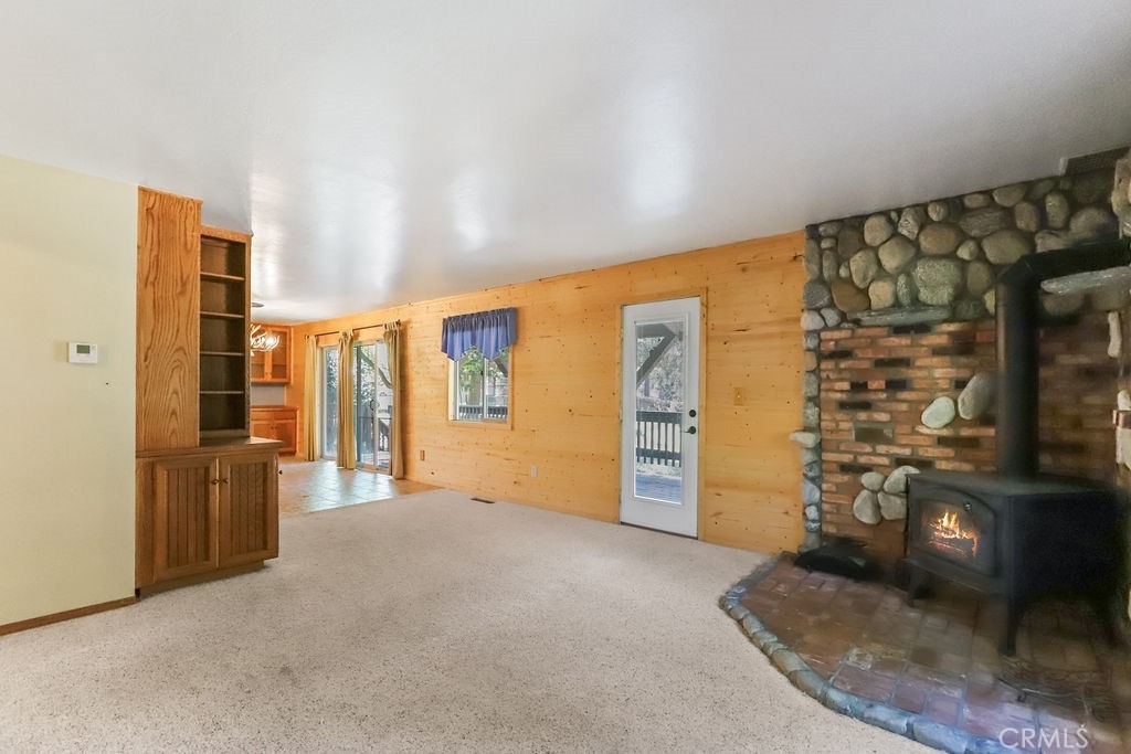 21645 Jobs Peak Road Cedarpines Park, CA 92322 - Photo 8 of 72 Living area leading to kitchen