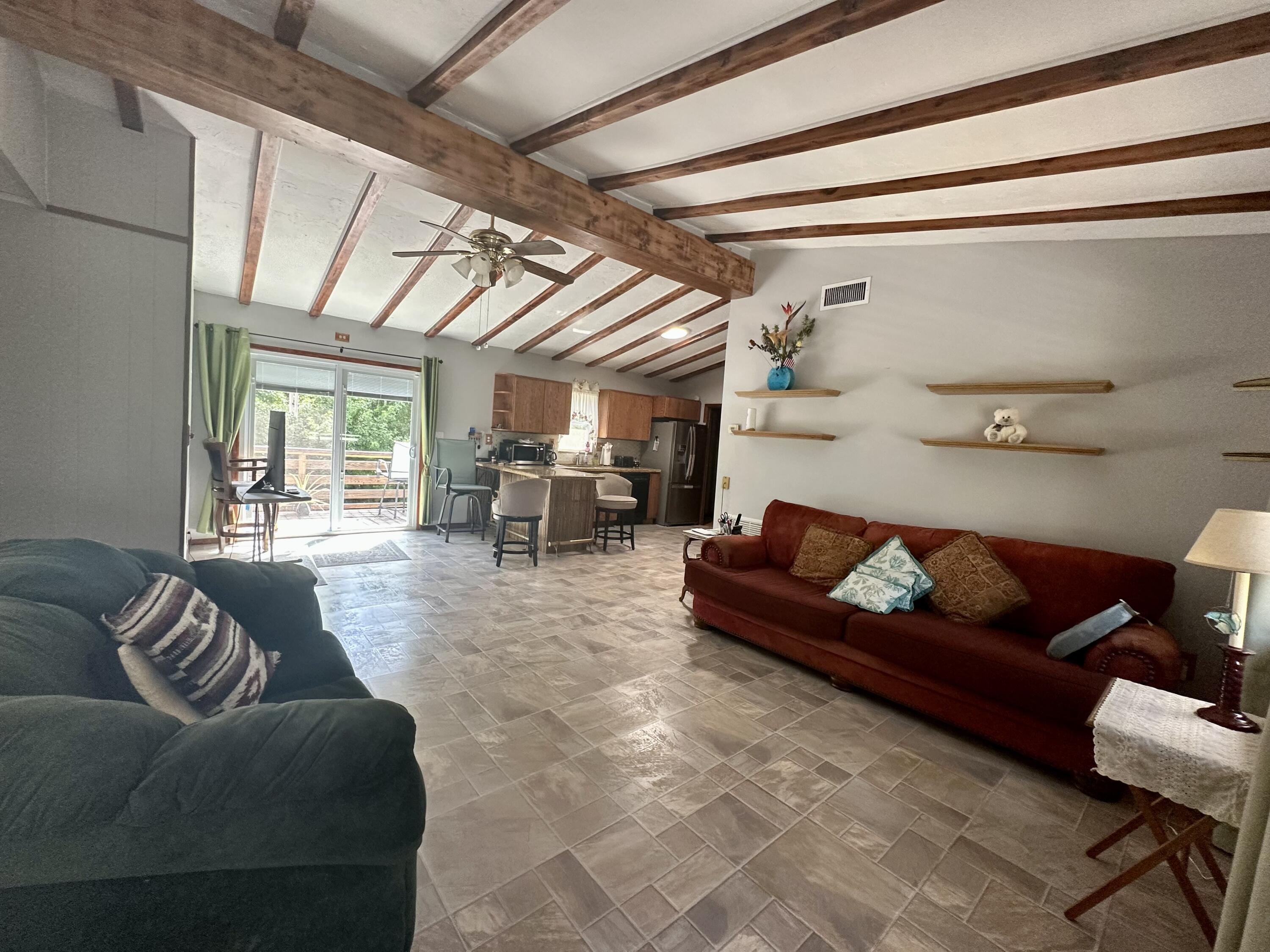 22 Stirrup Key Road Marathon, FL 33050 - Photo 3 of 15 a living room with furniture and a window