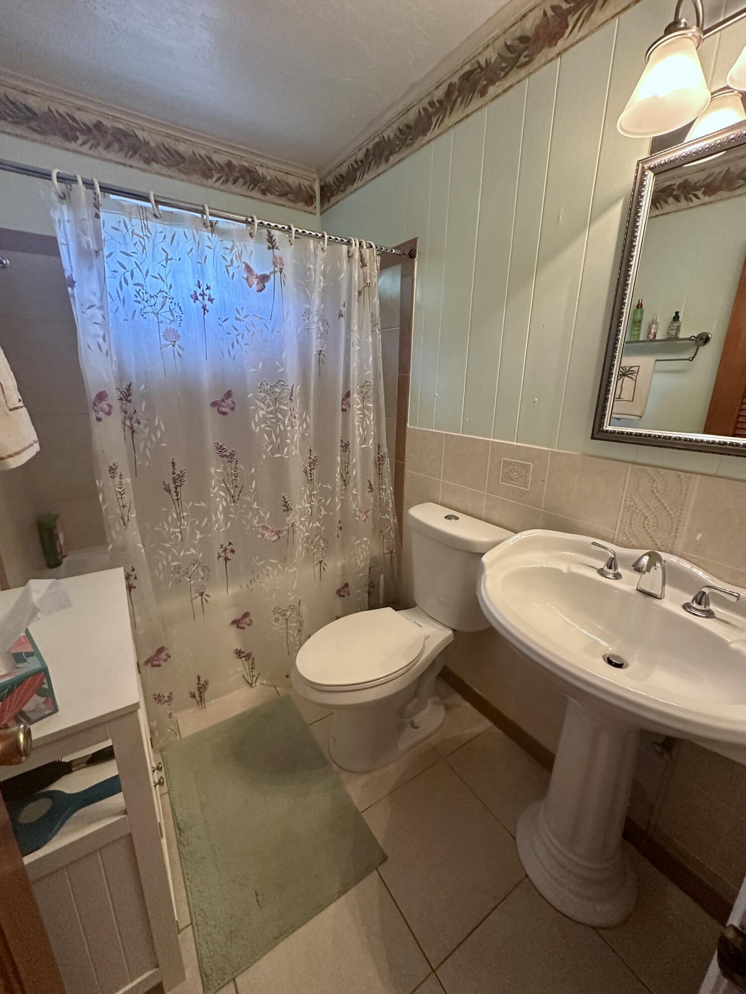 22 Stirrup Key Road Marathon, FL 33050 - Photo 10 of 15 a bathroom with a sink toilet and shower