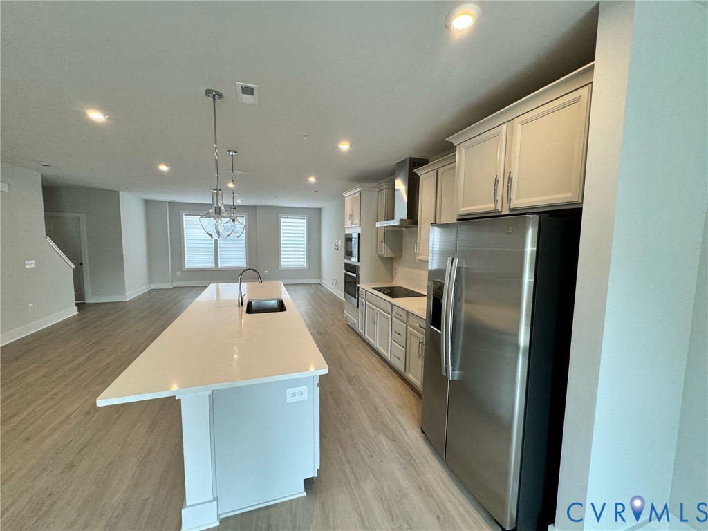 1512 West Moore Street, Unit B Richmond, VA 23220 - Photo 28 of 34 Kitchen with appliances with stainless steel finis