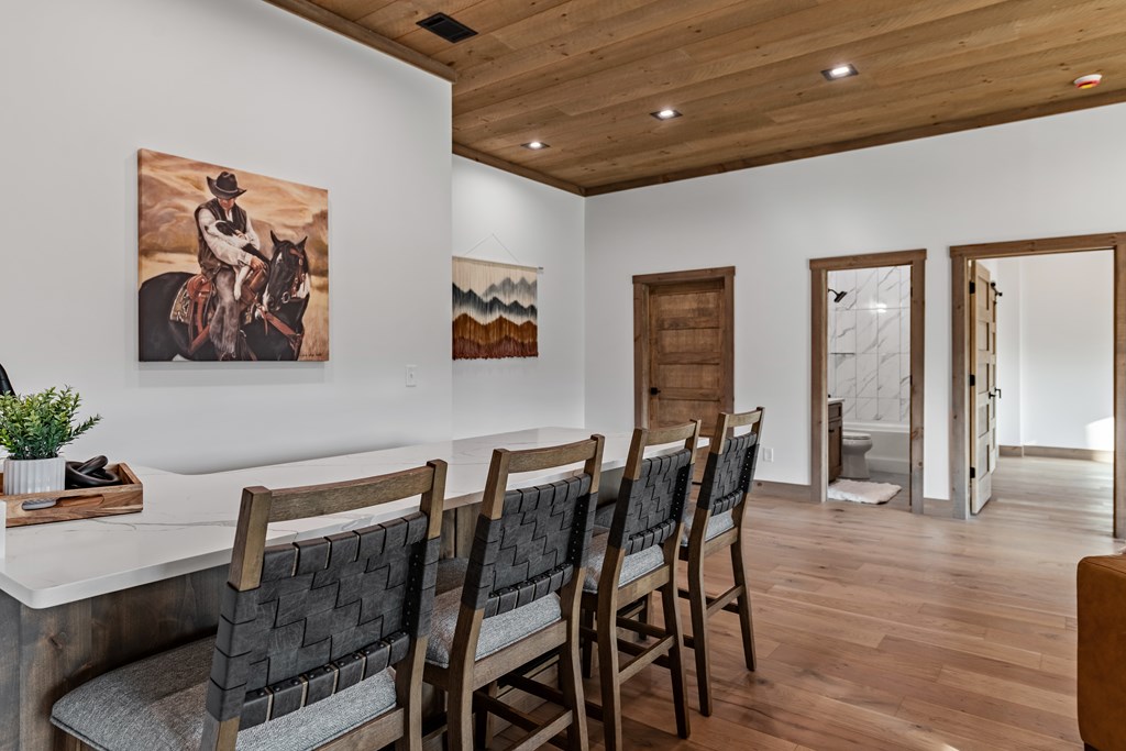 17 Rich Mountain Cherry Log, GA 30522 - Photo 17 of 57 a dining room with furniture and wooden floor