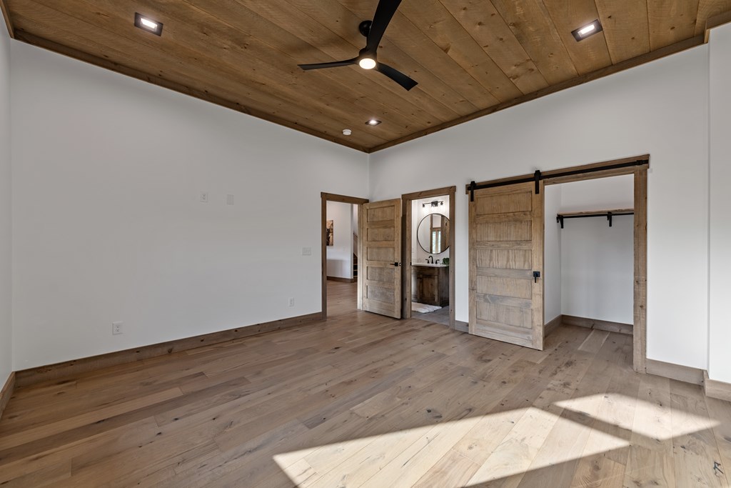 17 Rich Mountain Cherry Log, GA 30522 - Photo 29 of 57 en empty room with wooden floor