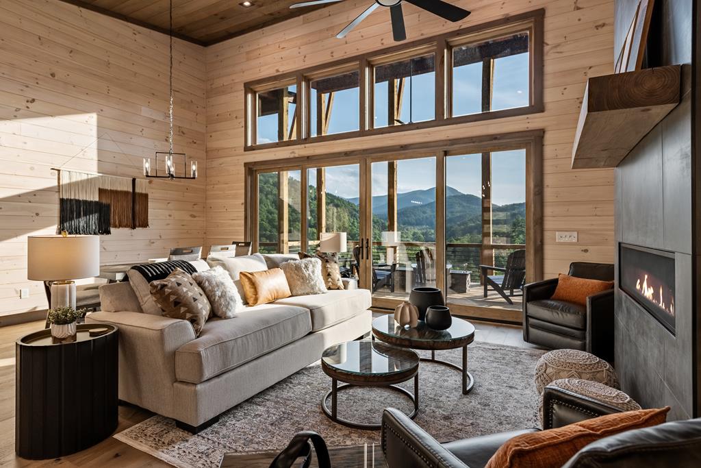 17 Rich Mountain Cherry Log, GA 30522 - Photo 3 of 57 a living room with furniture or fireplace and a flat screen tv