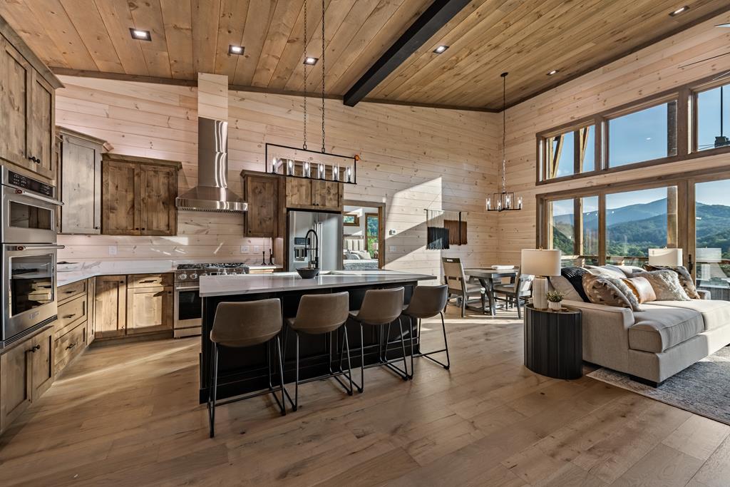 17 Rich Mountain Cherry Log, GA 30522 - Photo 32 of 57 a large kitchen with a table and chairs