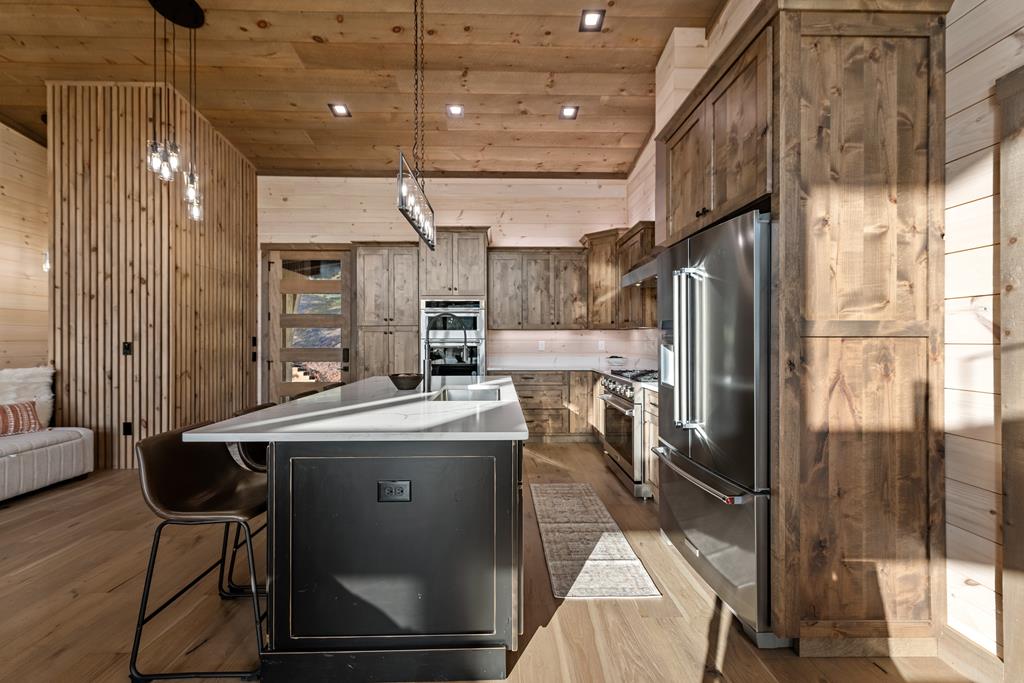 17 Rich Mountain Cherry Log, GA 30522 - Photo 34 of 57 a kitchen with stainless steel appliances granite countertop a stove and a refrigerator