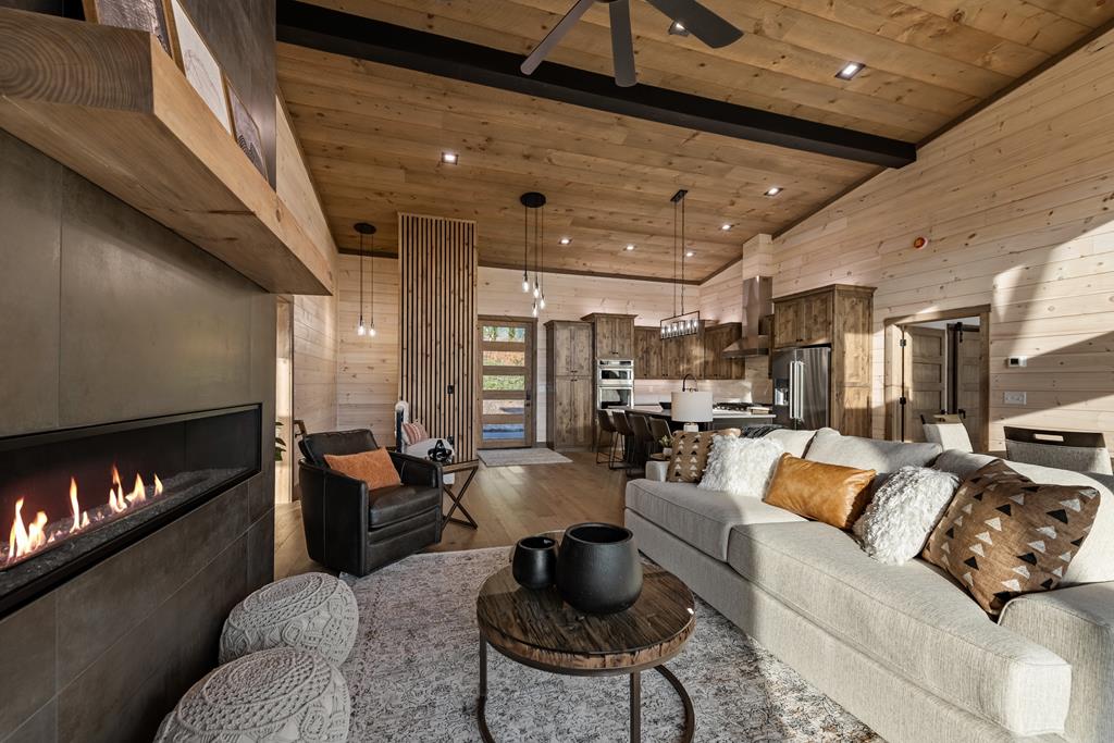 17 Rich Mountain Cherry Log, GA 30522 - Photo 35 of 57 a living room with furniture and a fireplace