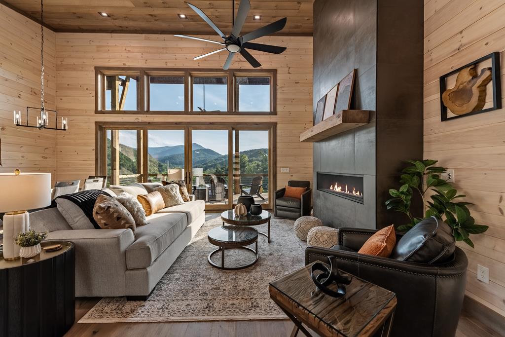 17 Rich Mountain Cherry Log, GA 30522 - Photo 37 of 57 a living room with furniture fireplace and a flat screen tv