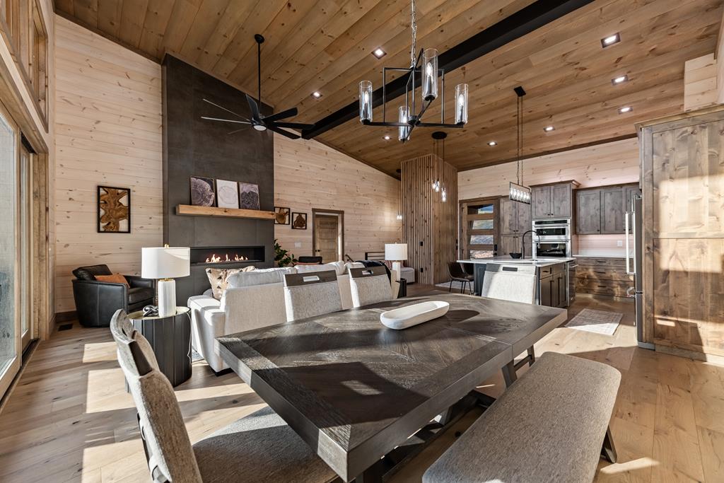 17 Rich Mountain Cherry Log, GA 30522 - Photo 4 of 57 a living room with furniture a table and kitchen view
