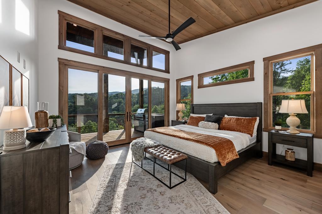 17 Rich Mountain Cherry Log, GA 30522 - Photo 41 of 57 a bedroom with a bed and a large window