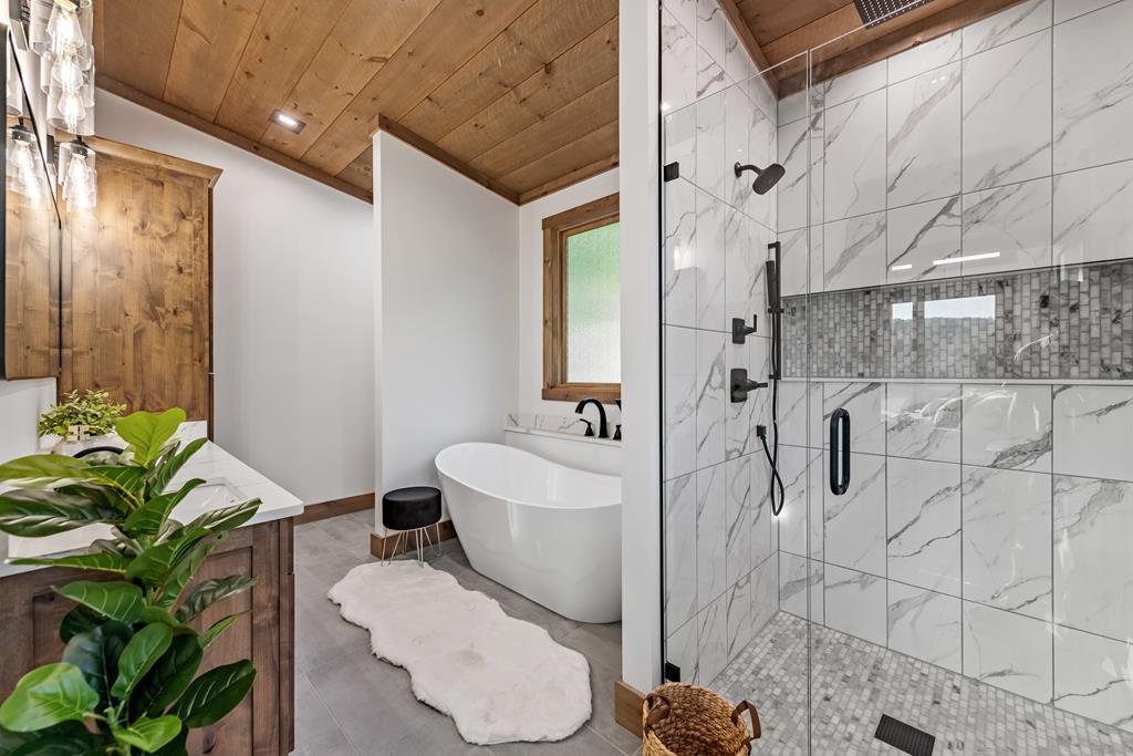 17 Rich Mountain Cherry Log, GA 30522 - Photo 46 of 57 a bathroom with a toilet sink and shower