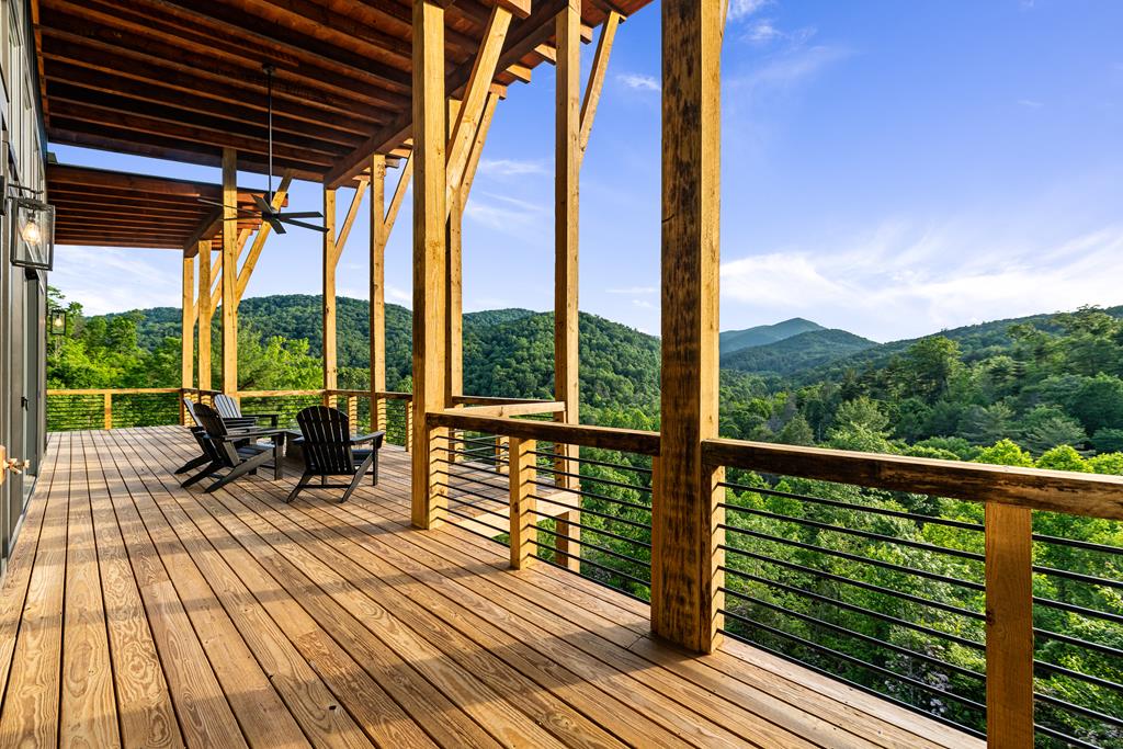 17 Rich Mountain Cherry Log, GA 30522 - Photo 54 of 57 a view of balcony with chairs and wooden floor
