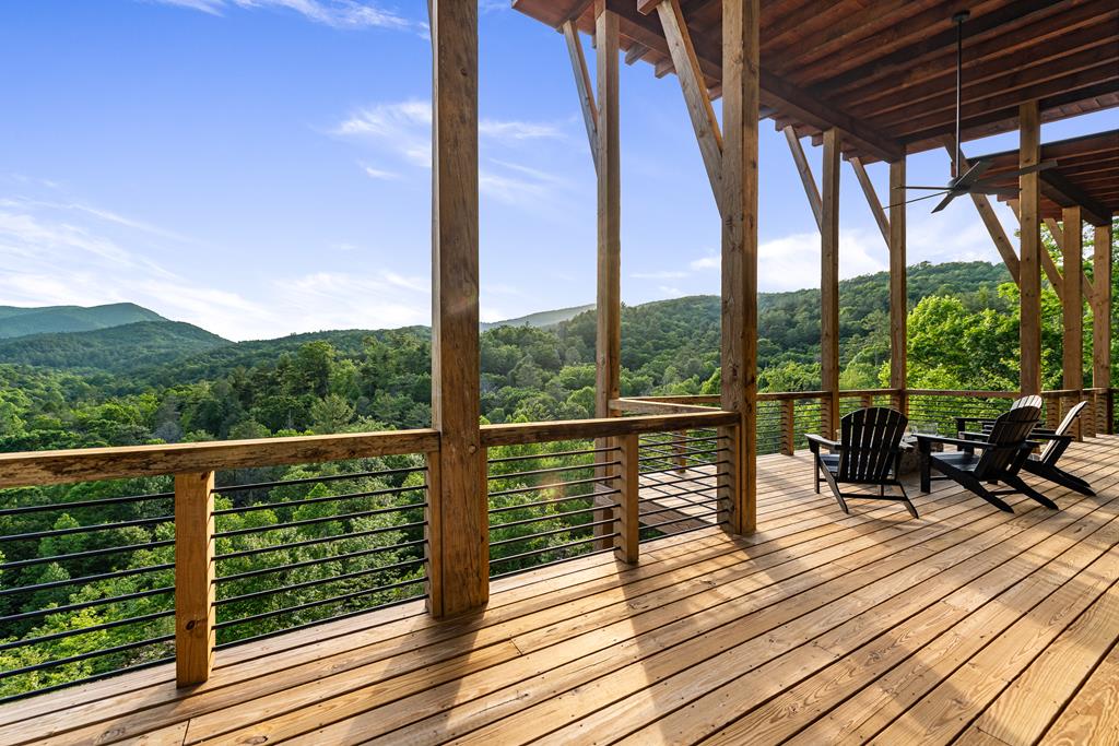 17 Rich Mountain Cherry Log, GA 30522 - Photo 55 of 57 a view of balcony with chairs and wooden floor