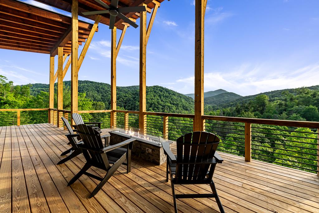 17 Rich Mountain Cherry Log, GA 30522 - Photo 57 of 57 a view of a balcony with wooden floor and outdoor seating