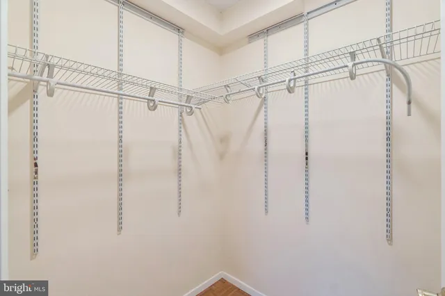 a bathroom with a shower and a shower head