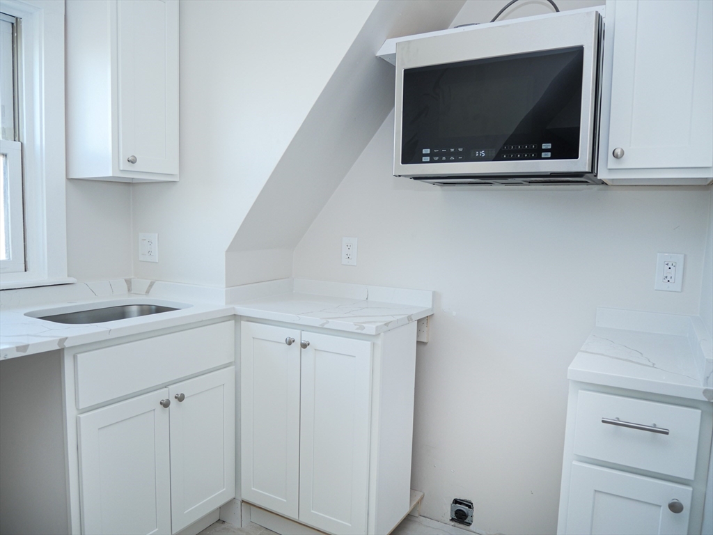 25 Garrison Road, Unit 4 Brookline, MA 02445 - Photo 2 of 8