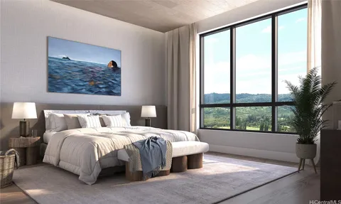 a bedroom with a bed and a large window