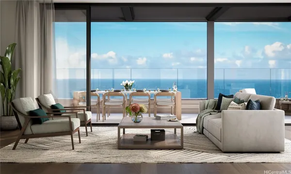 a living room with couches and a dining table with garden view