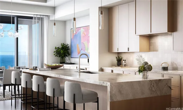 a kitchen with a table chairs sink and cabinets
