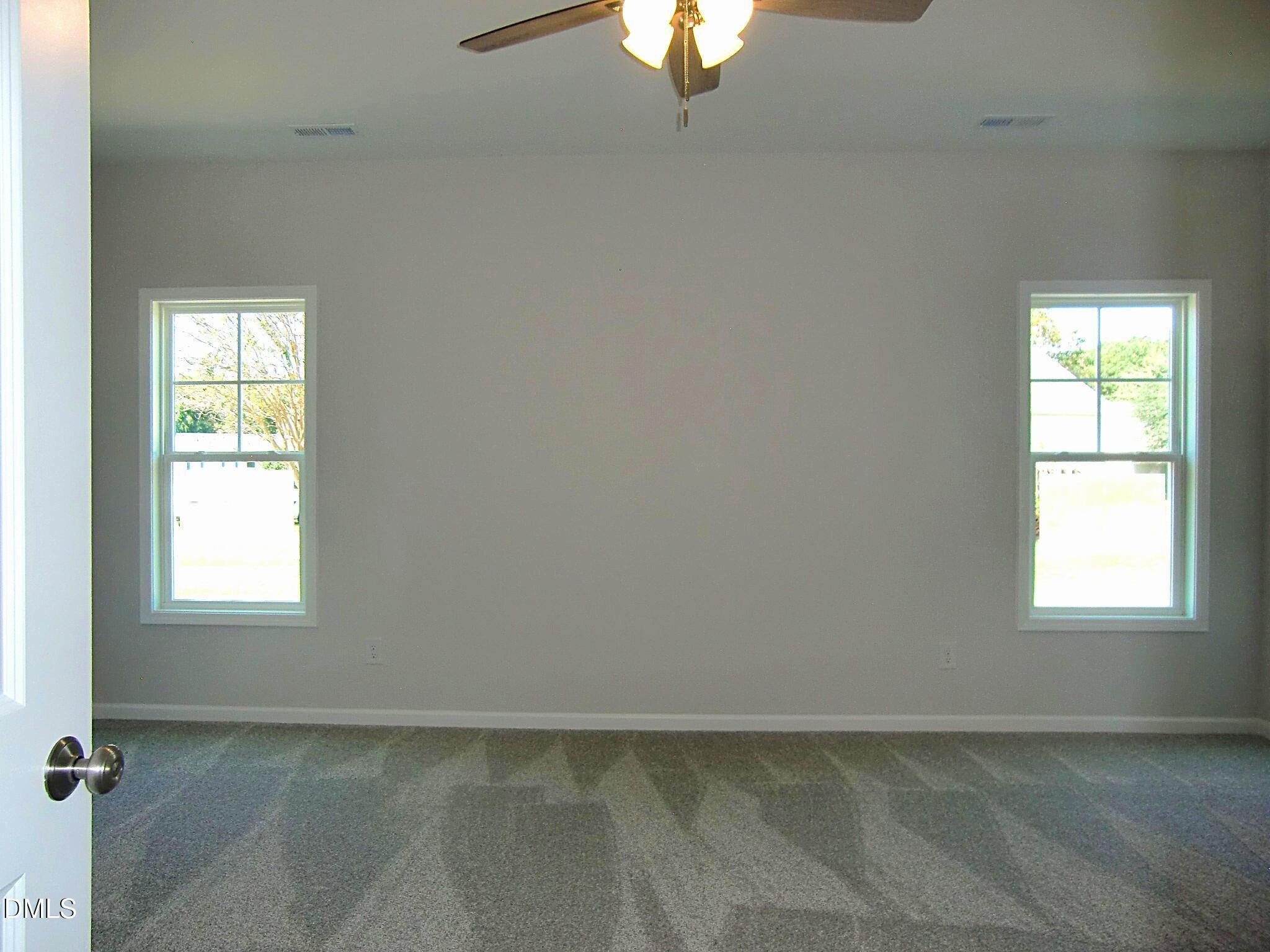 100 Covington Lane Dunn, NC 28334 - Photo 42 of 61 an empty room with a window