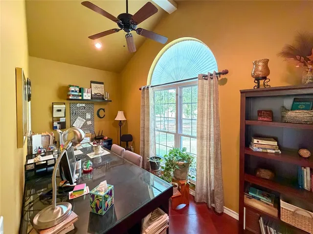 a workspace with furniture and wooden floor