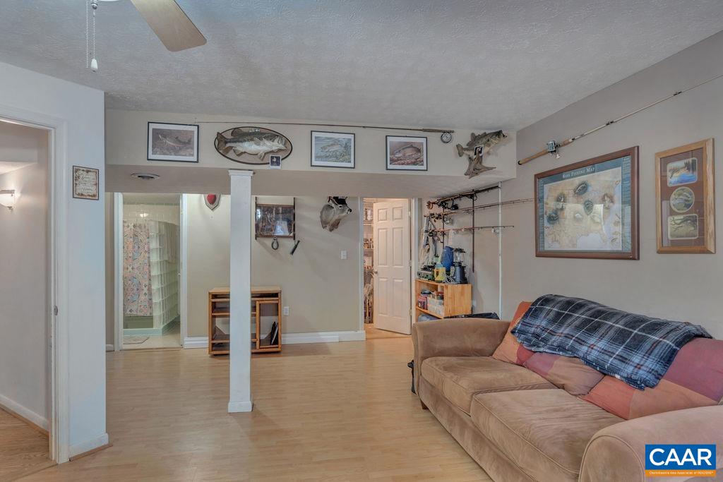 3 Stonefield Road Palmyra, VA 22963 - Photo 23 of 48 a living room with furniture and a area