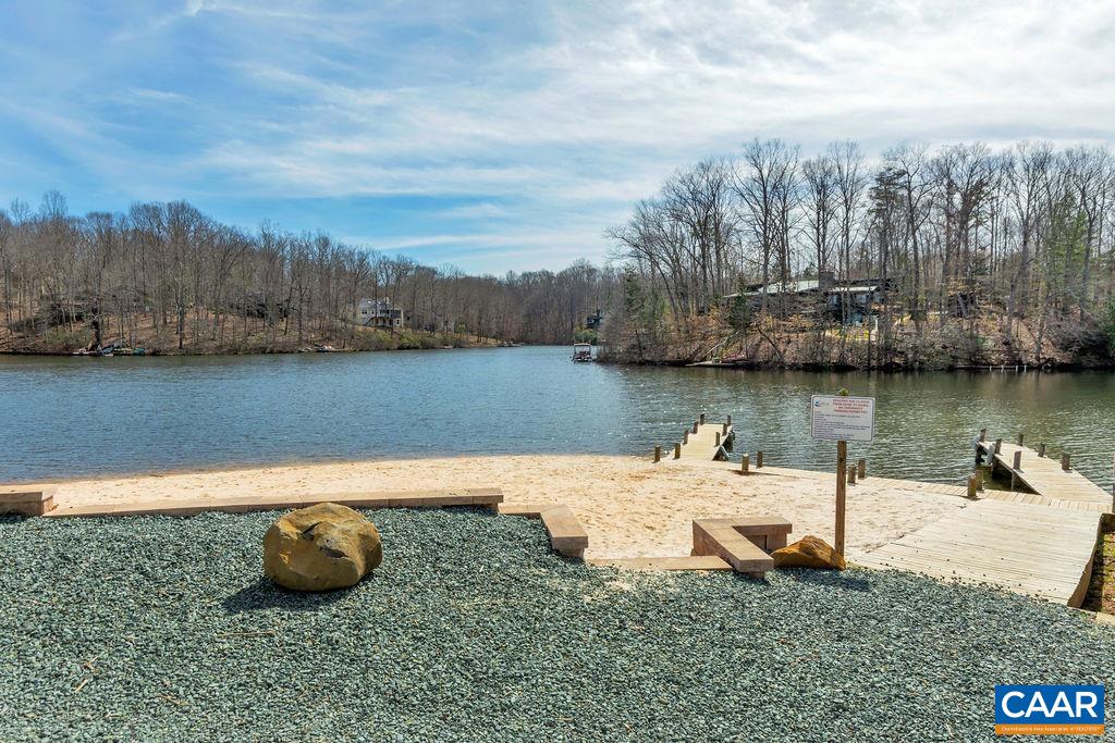 3 Stonefield Road Palmyra, VA 22963 - Photo 43 of 48 a view of a lake with houses in the back