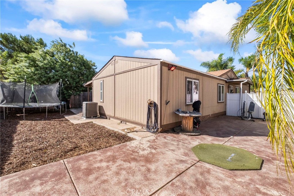24847 Split Rail Road Wildomar, CA 92595 - Photo 25 of 45 a bathroom with a sink and a mirror