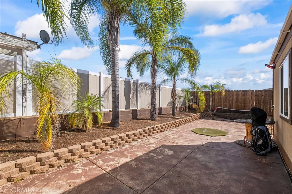 24847 Split Rail Road Wildomar, CA 92595 - Photo 26 of 45 a view of a backyard with palm trees